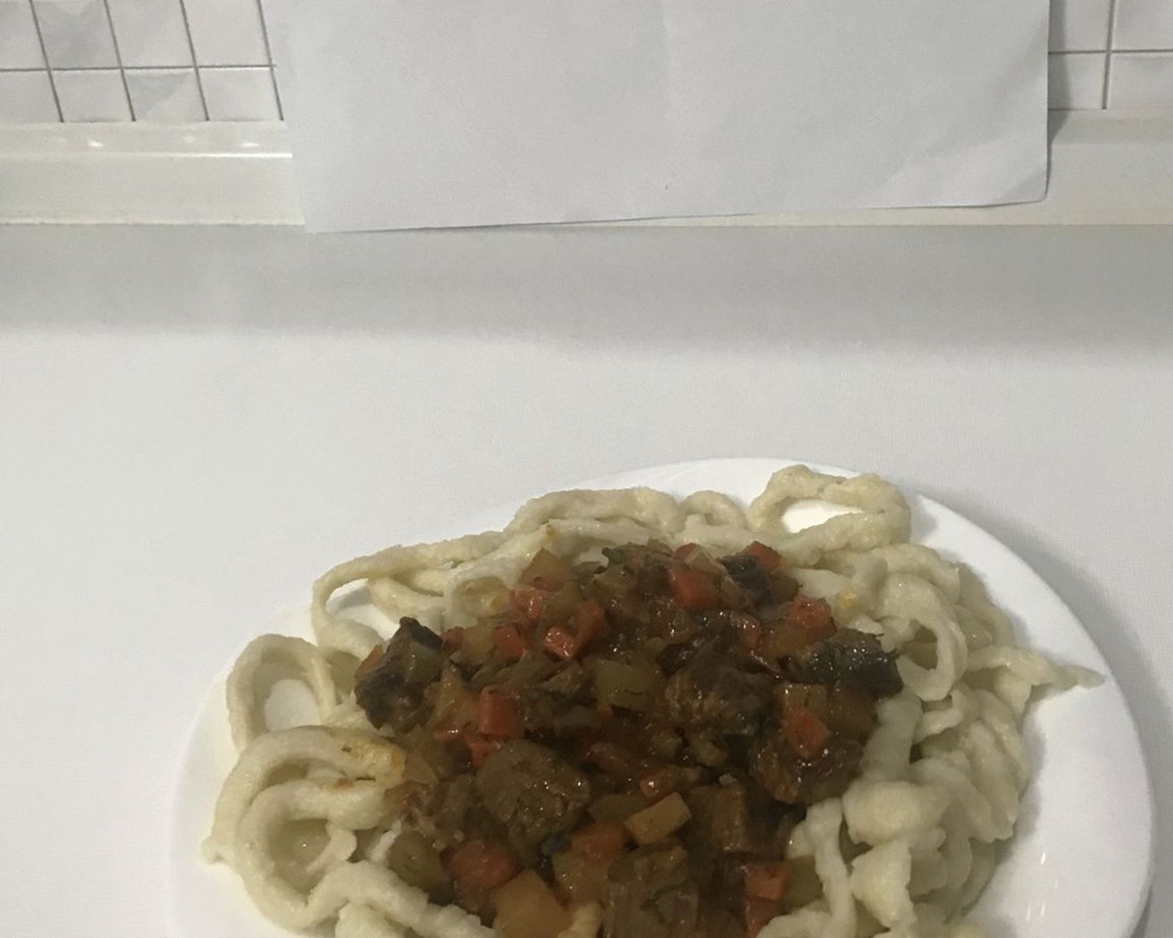 „”