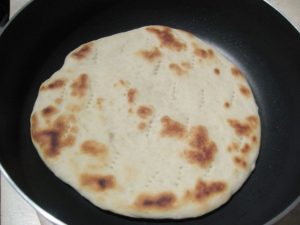 „”
