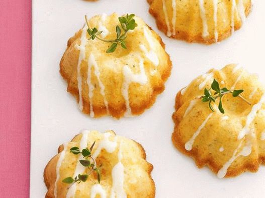 Az étel fényképe - Cupcakes kakukkfűvel és citrommázzal