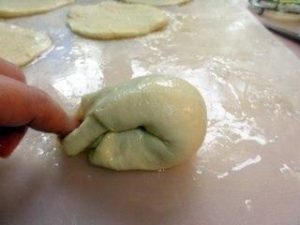 „”
