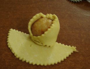 „”