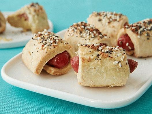 Fotókolbászok egy zsíros süteményben