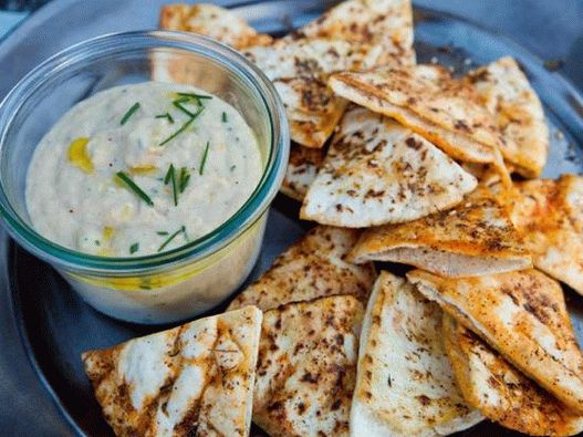 Az étel fotója - Fehérbab tört és tahini pita chipspel